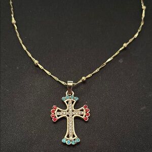 Elegant Gold Cross Pendant Necklace with Red and Blue Accents